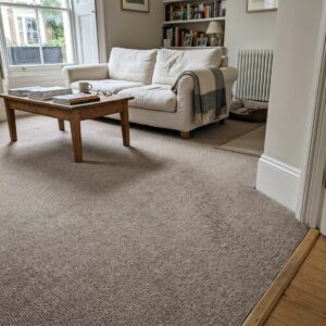 a well-maintained polypropylene carpet in a lived-in townhouse in Hampstead, London